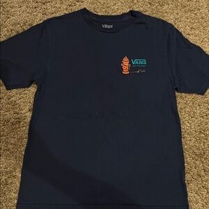 Vans Dark Blue Kids Shirt With Graphics On The Front And The Back Of The Shirt.